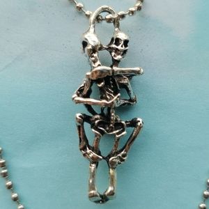 Entertwined Skeleton Lovers Necklace.